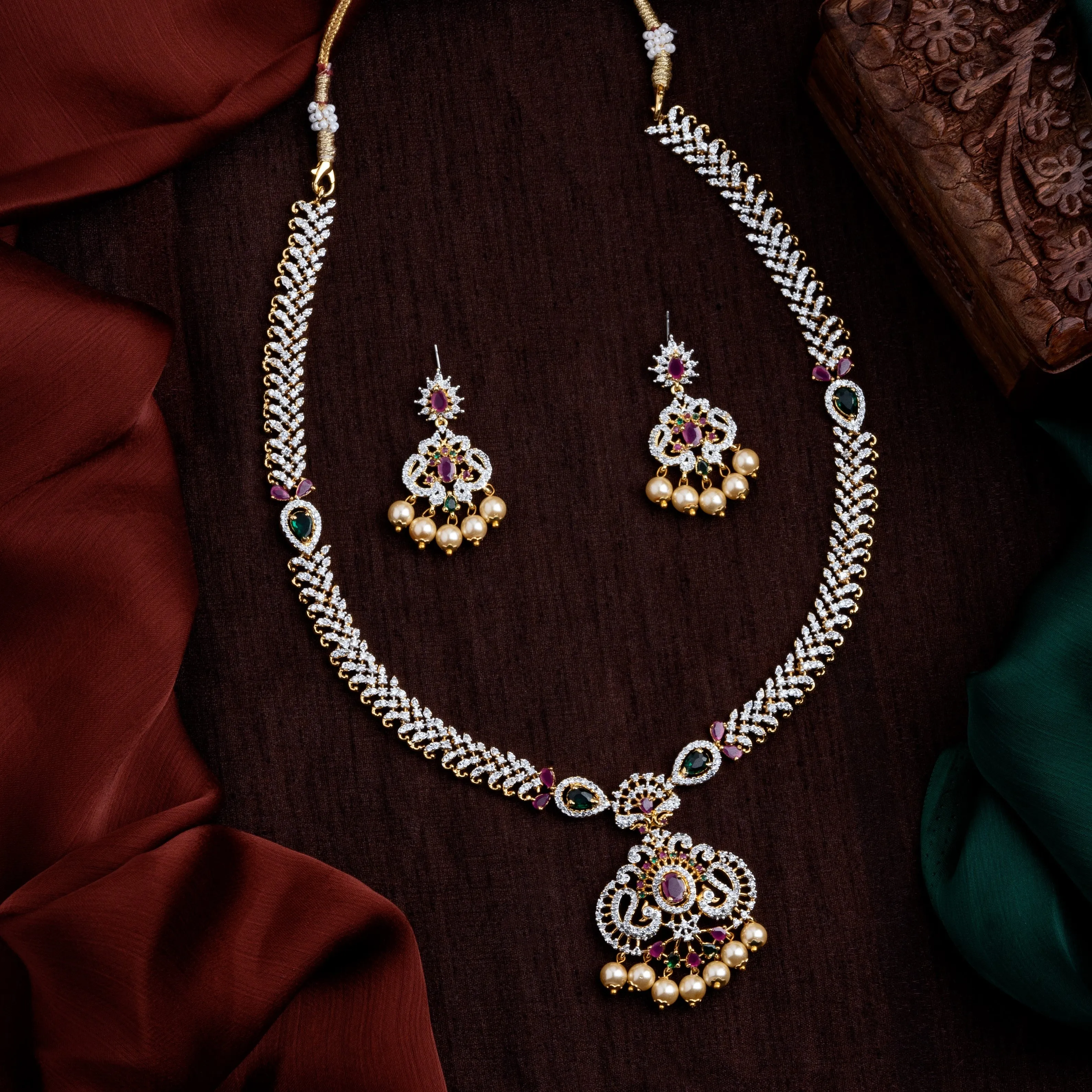 Estele Gold Plated CZ Peacock Inspired Long Necklace set with Pearls & Colored stones for Women